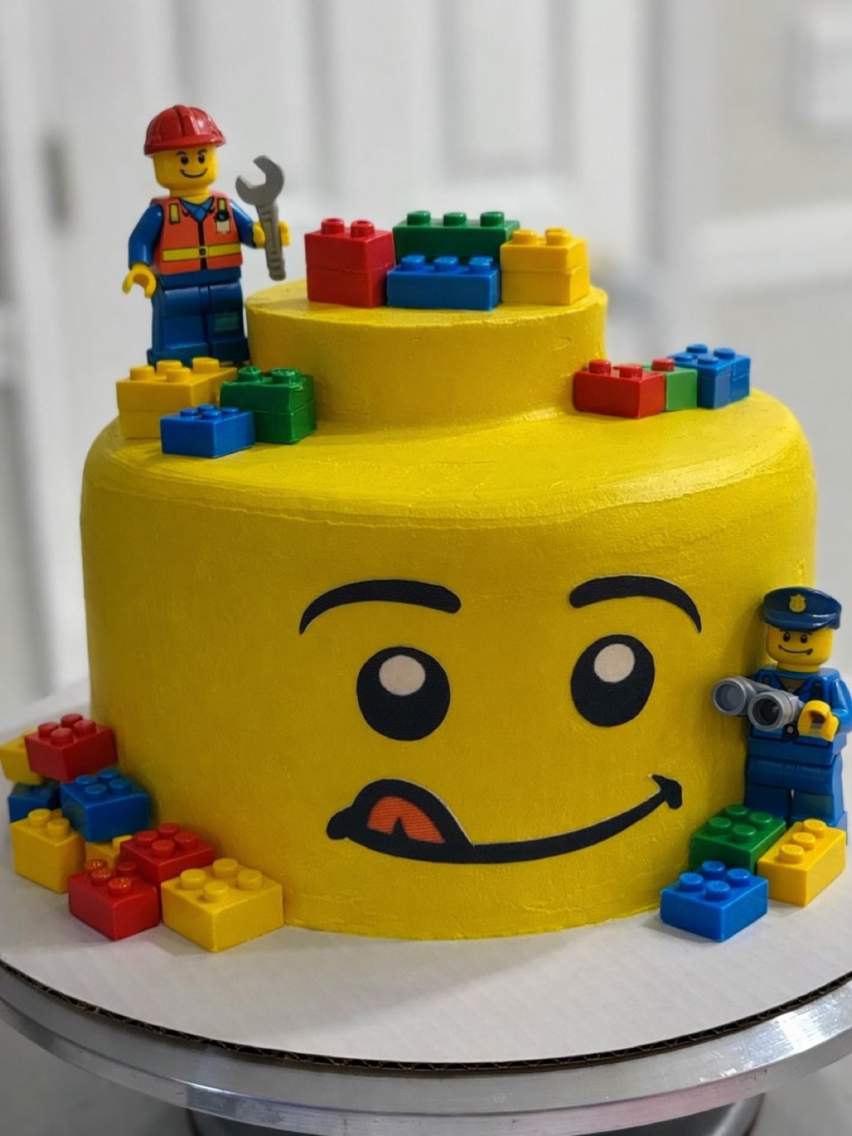 Colorful custom Lego birthday cake by Pura Dulzura Desserts in Central Florida