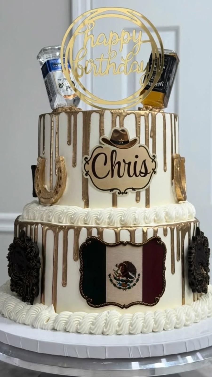 Two-tier custom drip cake with gold accents for a Central Florida birthday