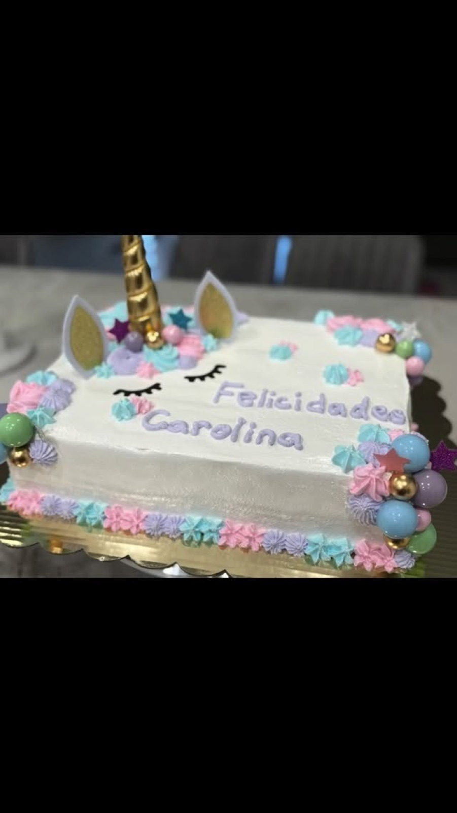 Pastel unicorn sheet cake for a birthday dessert table in Central Florida
